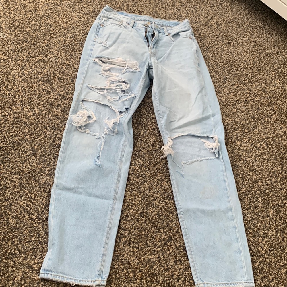 light blue ripped jeans